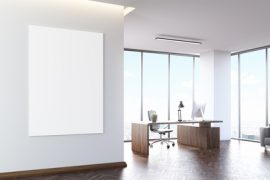 Office interior of board member with wooden desk and computer. Gray sofa and coffee table in corner. Panoramic window. 3d rendering. Mockup.